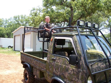 mini truck with safari rack for hunting