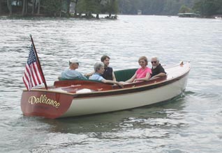 socializing in an electric wooden boat